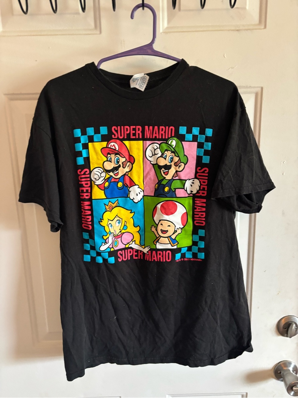 Delta Black Super Mario Graphic Tee with Red, Green, Yellow & Blue Accents